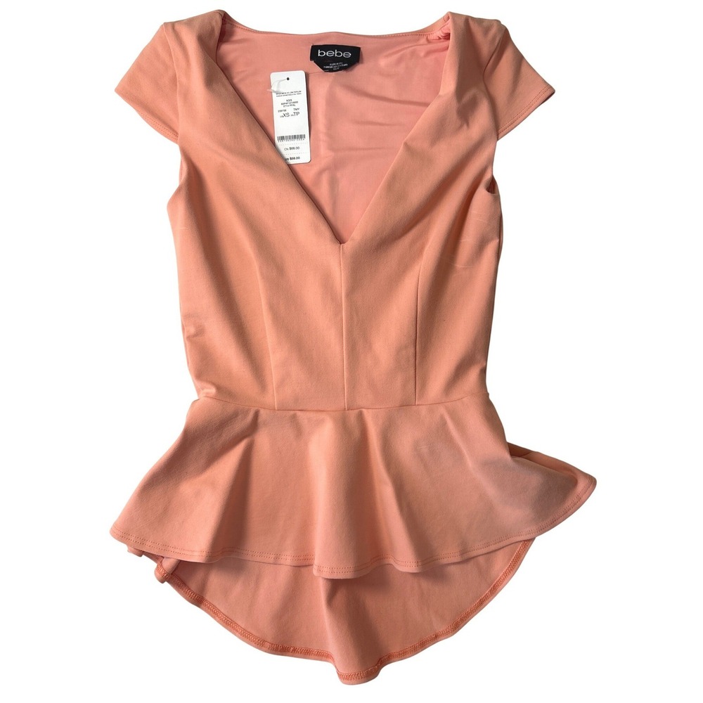 NWT Bebe XS Coral Peach Split Neck Hi-Low Peplum Top Cap Sleeve Office Evening‎